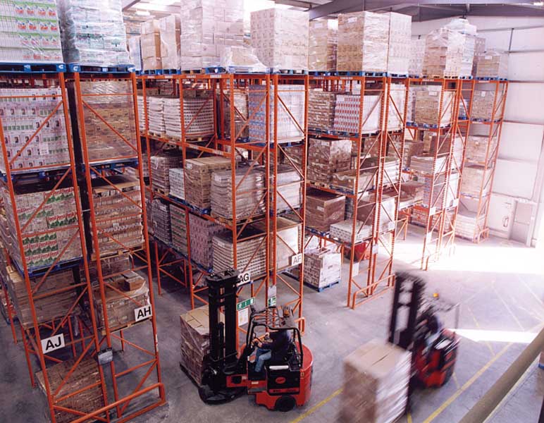 pallets being moved around a warehouse