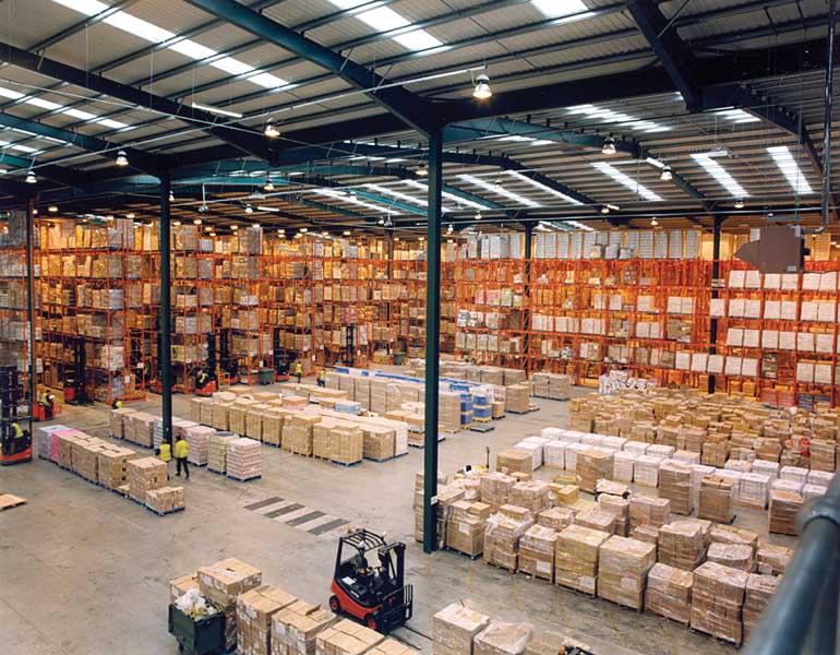 warehouse filled with produce ready to be stacked