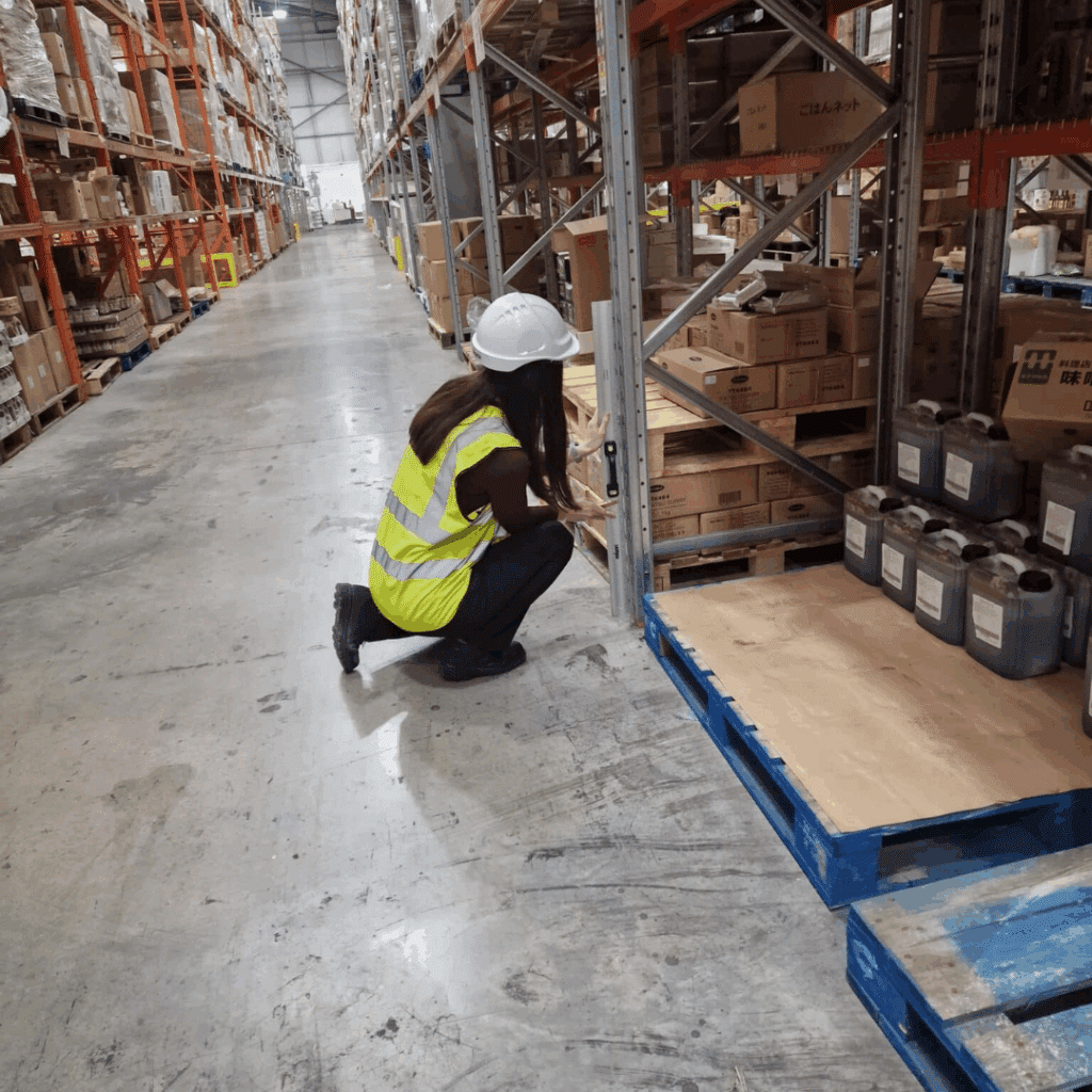 A risk assessment being performed by a RediRack inspector prior to warehouse racking installation